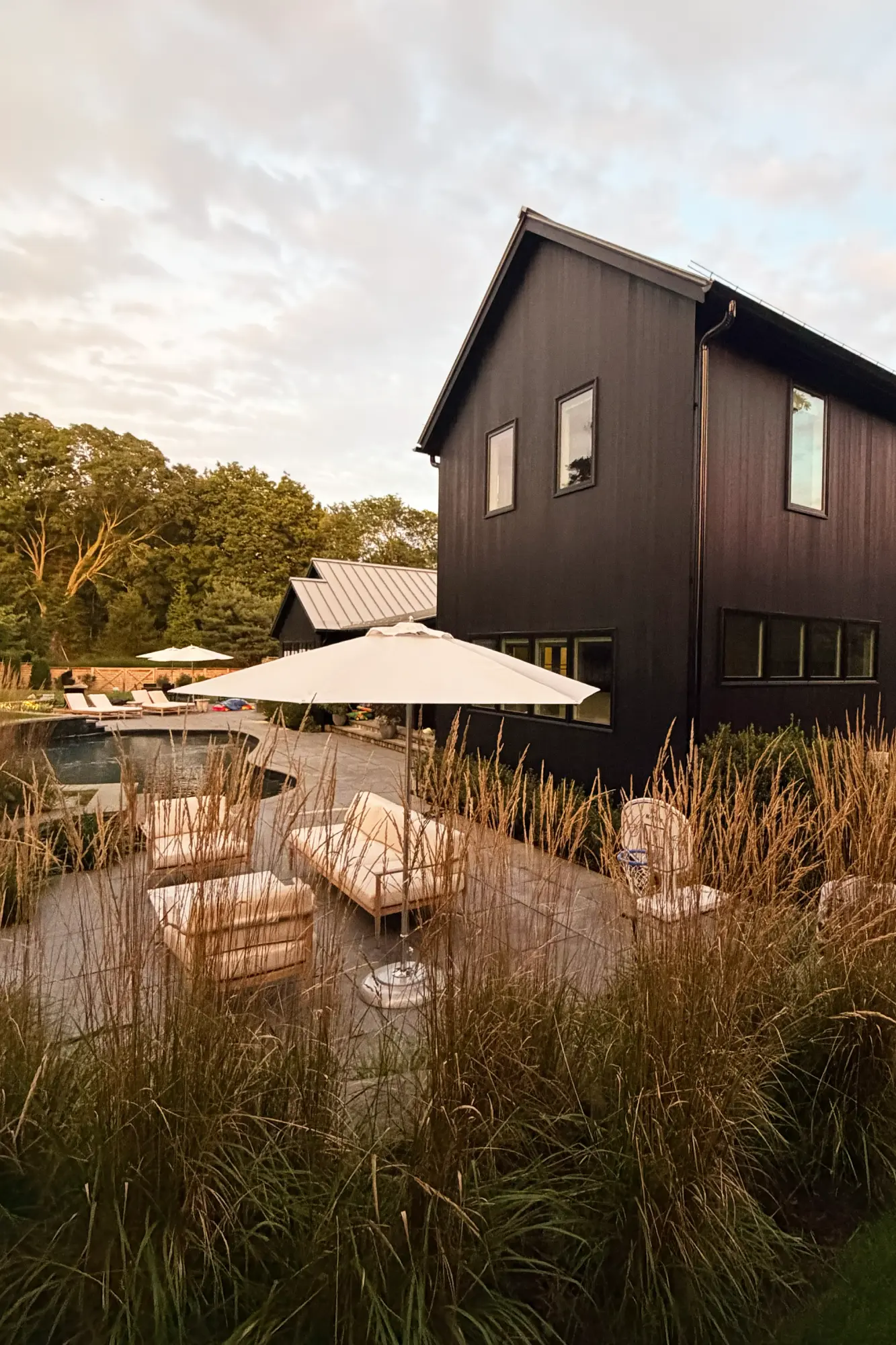 Pond House in Westport, CT, by Spring Architecture + Design, is a 4,500 sq ft coastal renovation blending modern farmhouse and Japanese architecture with waterfront views and refined outdoor living.