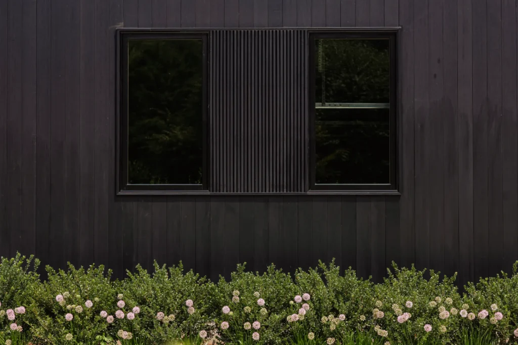 Pond House in Westport, CT, by Spring Architecture + Design, is a 4,500 sq ft coastal renovation blending modern farmhouse and Japanese architecture with waterfront views and refined outdoor living.