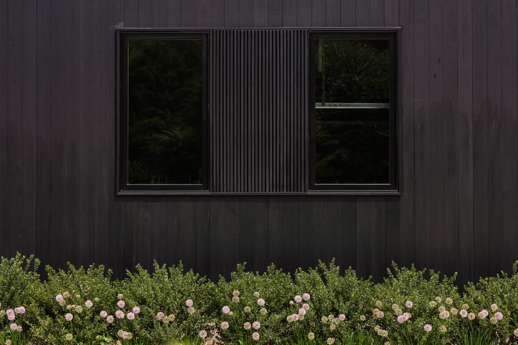 Pond House in Westport, CT, by Spring Architecture + Design, is a 4,500 sq ft coastal renovation blending modern farmhouse and Japanese architecture with waterfront views and refined outdoor living.