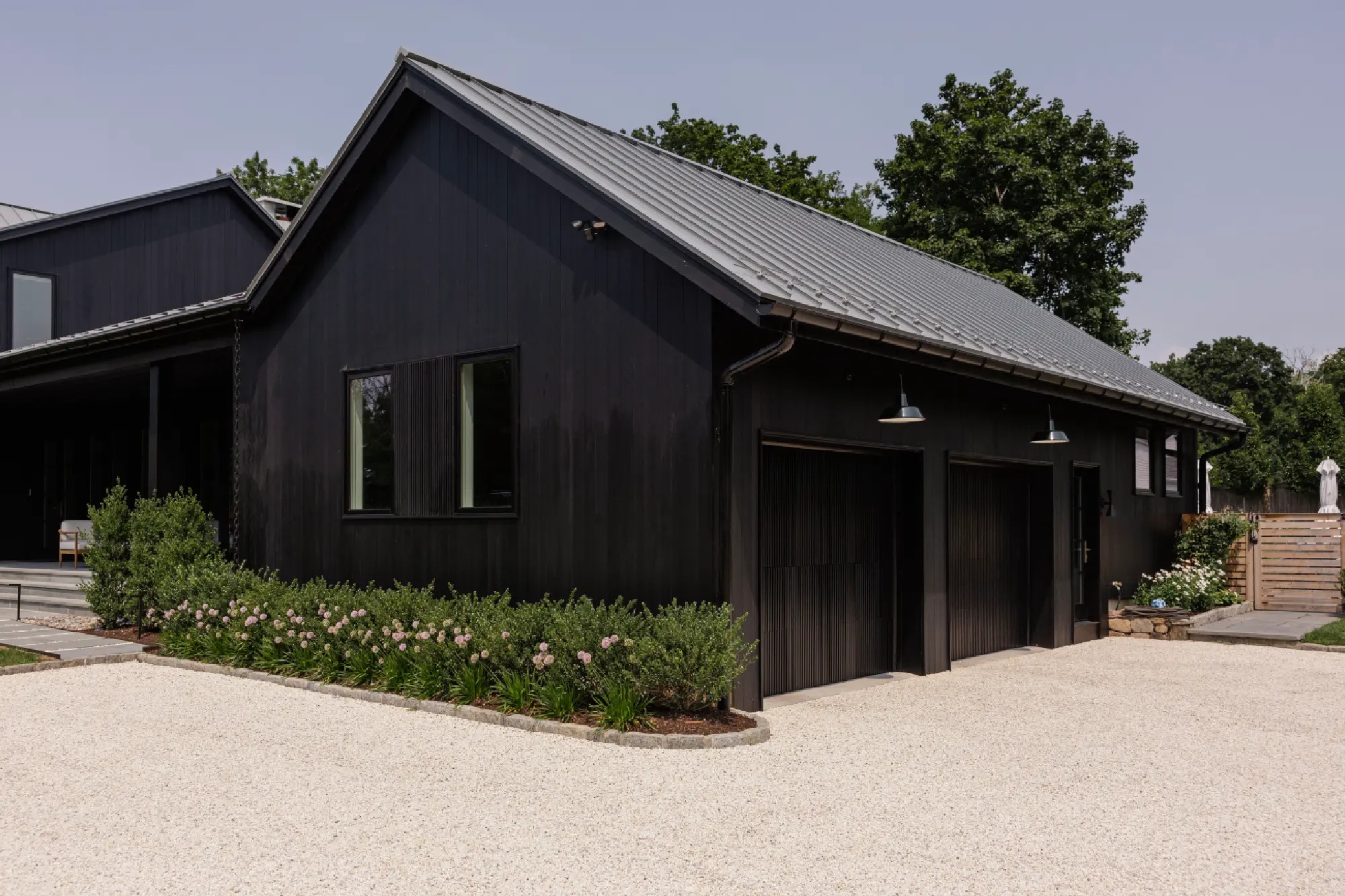 Pond House in Westport, CT, by Spring Architecture + Design, is a 4,500 sq ft coastal renovation blending modern farmhouse and Japanese architecture with waterfront views and refined outdoor living.