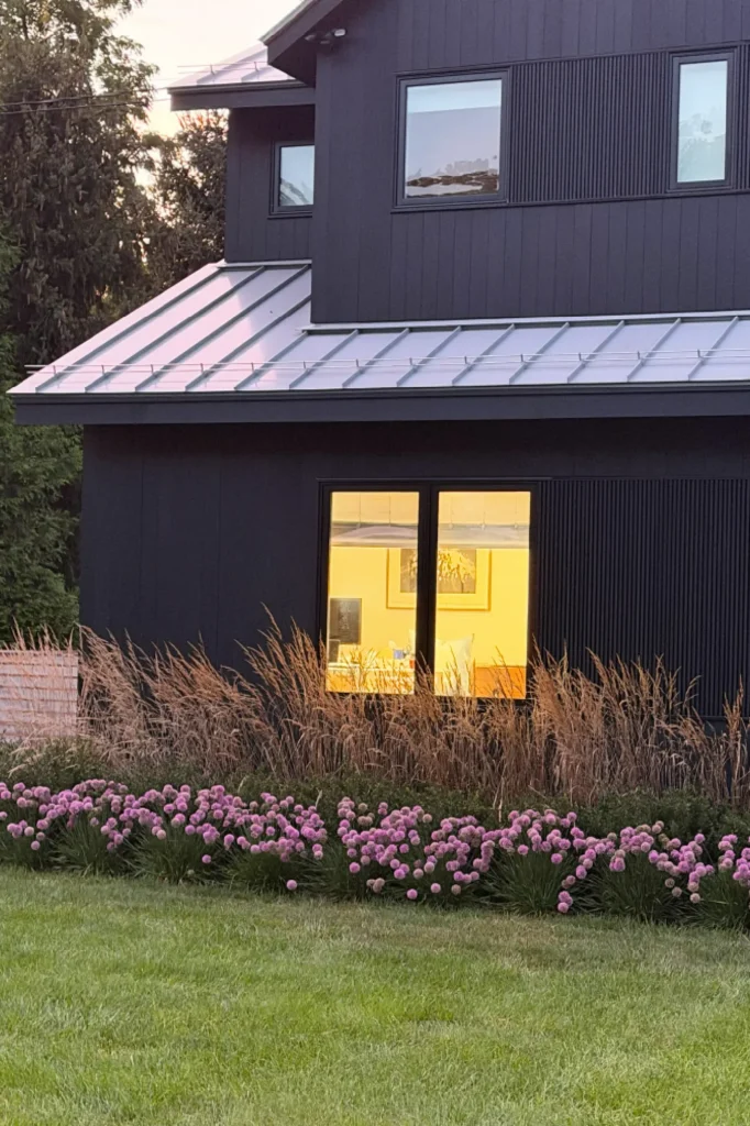 Pond House in Westport, CT, by Spring Architecture + Design, is a 4,500 sq ft coastal renovation blending modern farmhouse and Japanese architecture with waterfront views and refined outdoor living.