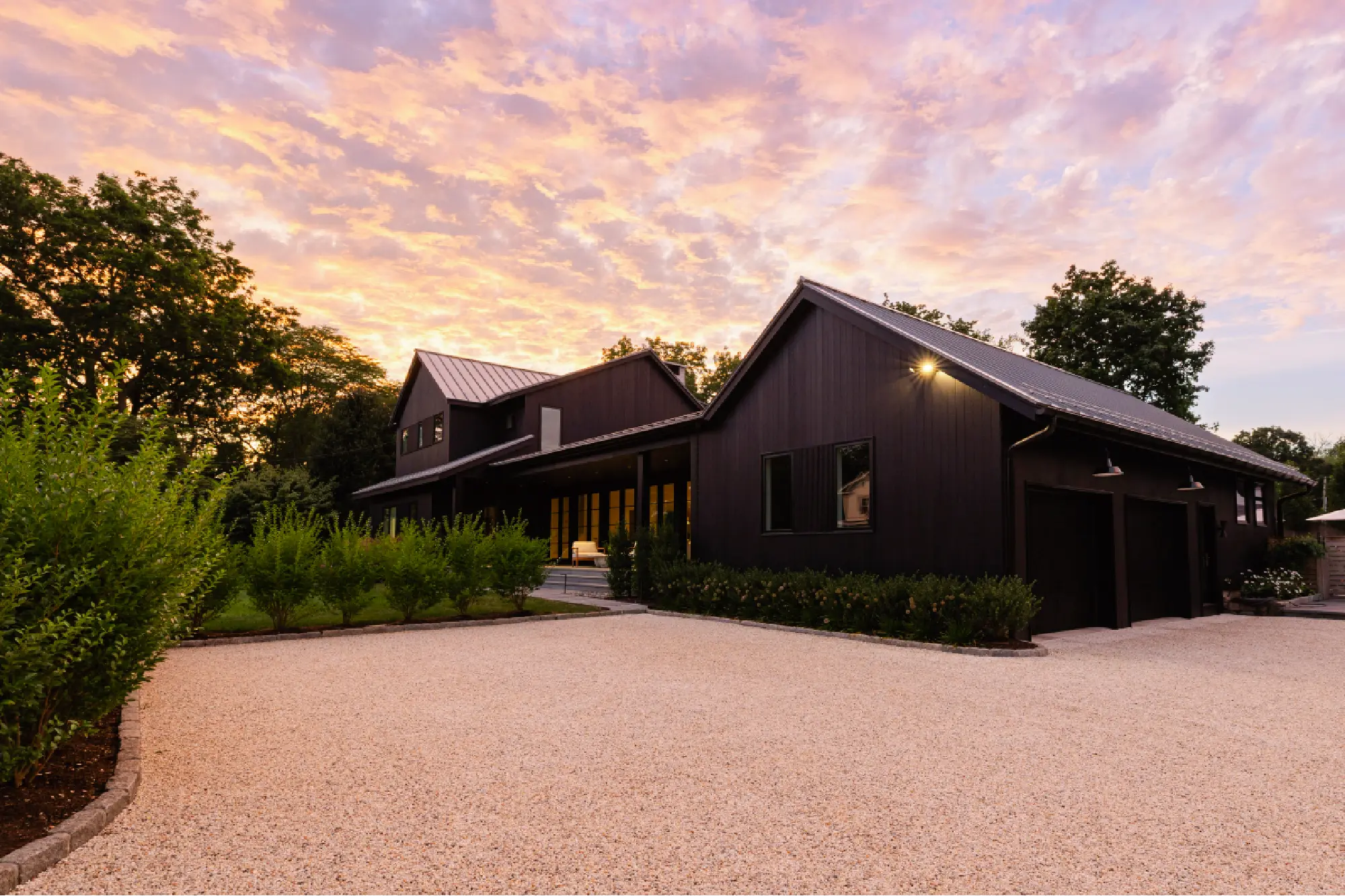 Pond House in Westport, CT, by Spring Architecture + Design, is a 4,500 sq ft coastal renovation blending modern farmhouse and Japanese architecture with waterfront views and refined outdoor living.
