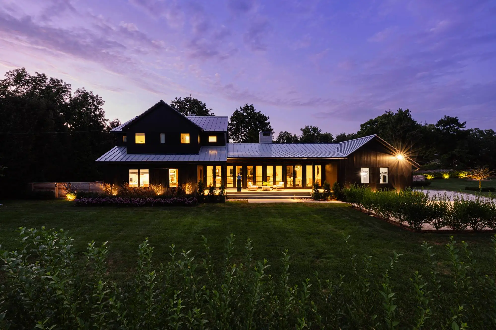 Pond House in Westport, CT, by Spring Architecture + Design, is a 4,500 sq ft coastal renovation blending modern farmhouse and Japanese architecture with waterfront views and refined outdoor living.