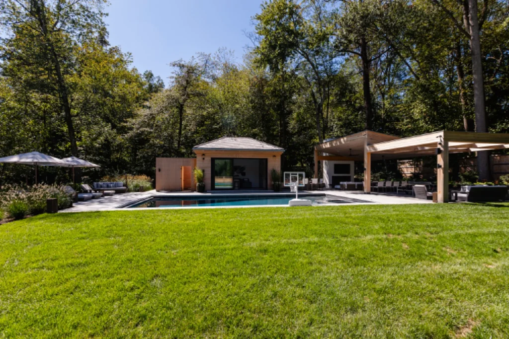 Resort House by Spring Architecture + Design, a 3,800 sq ft sustainable coastal residence featuring modern architecture, net-zero energy design, luxury outdoor living, pool house, and energy-efficient systems.