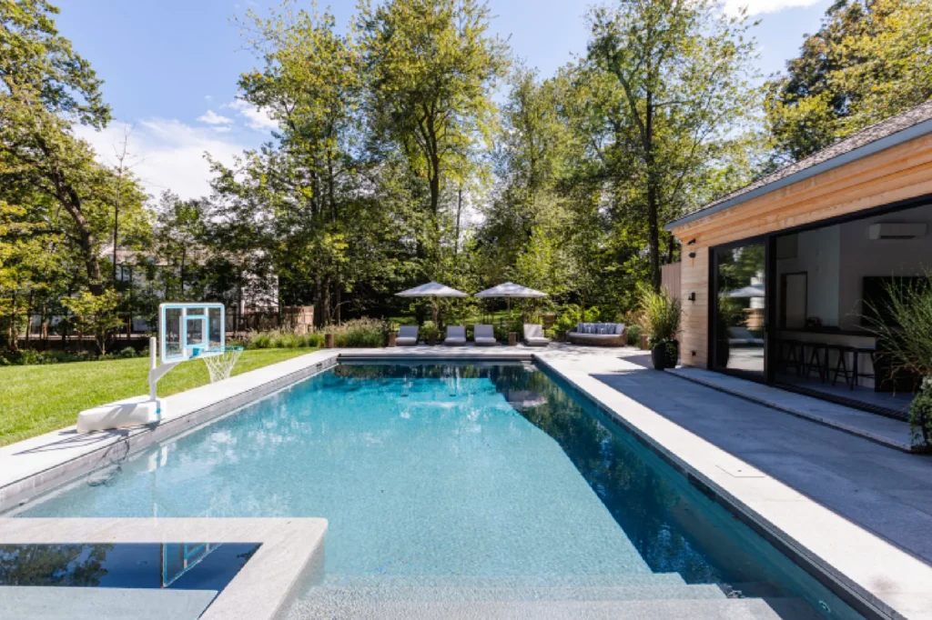 Resort House by Spring Architecture + Design, a 3,800 sq ft sustainable coastal residence featuring modern architecture, net-zero energy design, luxury outdoor living, pool house, and energy-efficient systems.