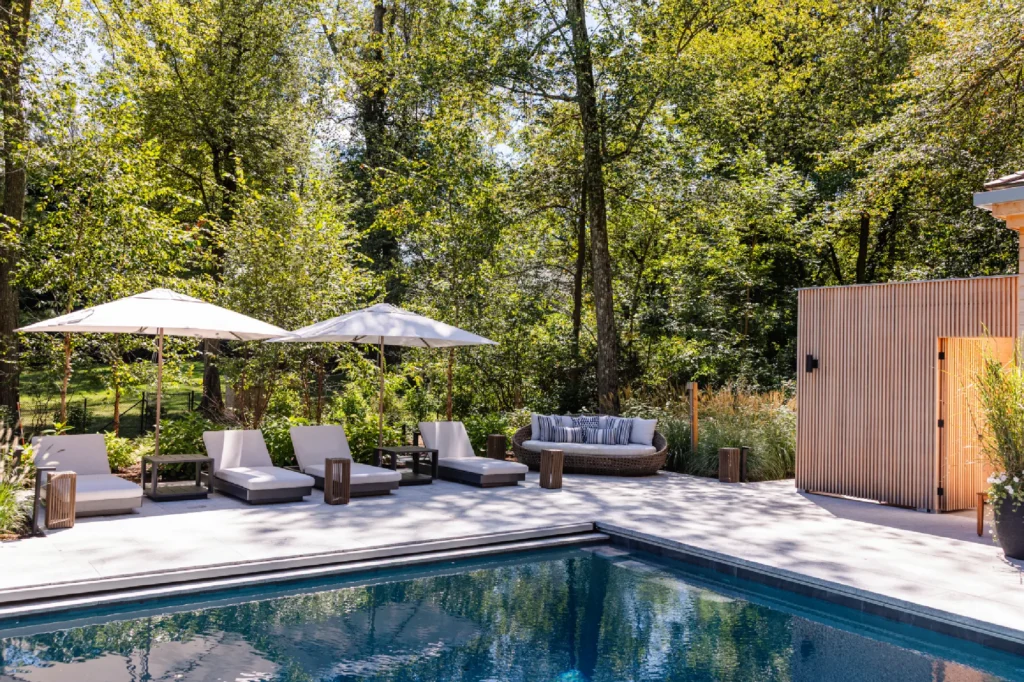 Resort House by Spring Architecture + Design, a 3,800 sq ft sustainable coastal residence featuring modern architecture, net-zero energy design, luxury outdoor living, pool house, and energy-efficient systems.