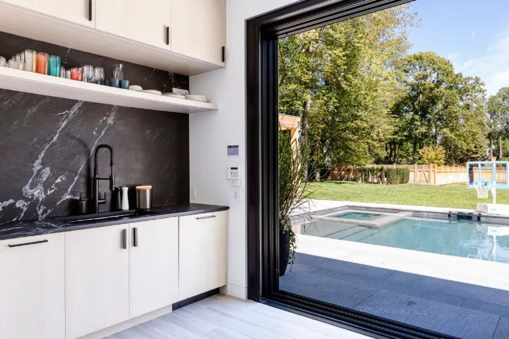 Resort House by Spring Architecture + Design, a 3,800 sq ft sustainable coastal residence featuring modern architecture, net-zero energy design, luxury outdoor living, pool house, and energy-efficient systems.