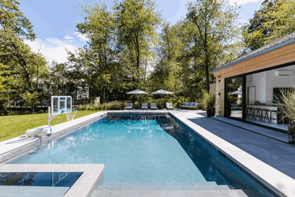 Resort House by Spring Architecture + Design, a 3,800 sq ft sustainable coastal residence featuring modern architecture, net-zero energy design, luxury outdoor living, pool house, and energy-efficient systems.